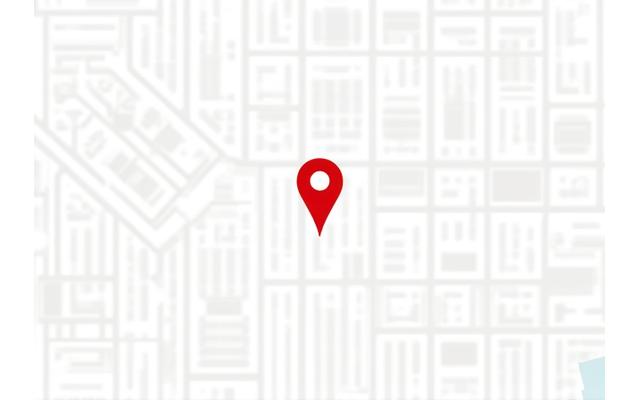 Mapa detallado de Madrid enfocado en el centro, con un pin destacando la ubicación de la oficina de LuminaSync en la Calle de Atocha. Edificios emblemáticos cercanos pueden ser sutilmente visibles.